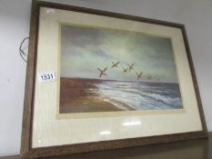 A pair of framed and glazed prints 'A Norfolk Foreshore' after the original oil by D Sherrin.
