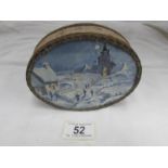 A chocolate box with embroidered sides and signed winter scene in lid.