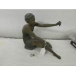 An art deco spelter nude figure possibly from top of a clock.