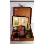 A leather case containing commemorative medallions, Victorian photograph book, silver cuff links,