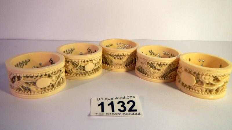 5 19th century carved ivory napkin rings. - Image 6 of 6