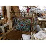 A Victorian 3 fold brass fire screen with leaded and stained glass panels.