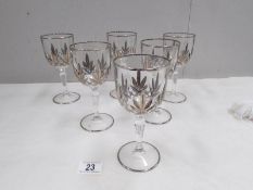 A set of 6 wine goblets decorated with white metal.