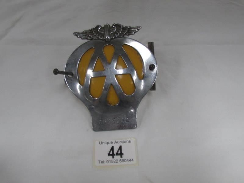 A chromed AA badge.