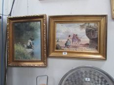 2 'oiled' prints in gilt coloured frames.