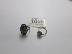 A gold band dress ring and a decorative marcasite ring, both size M.