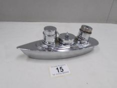 An art deco novelty white metal boat condiment set.