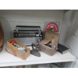 A mixed lot including radio, gas mask, mincer, flat iron etc.