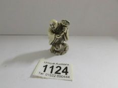 A 19th century ivory immortal netsuke.