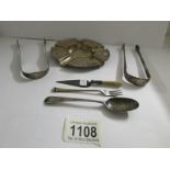 A silver ashtray, 2 silver sugar tongs, a spoon, small eel fork and Mason's trowel page turner,