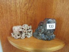 2 soapstone carvings.