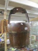 A wooden well bucket.