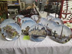 A set of 12 Limoges Parisienne series collector's plates by Louise Dali.