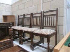 A set of 4 oak dining chairs,