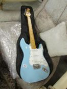 A 'Blue rock' Fender style electric guitar with soft case.