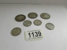 7 silver coins being 3 half crowns (1890, 1897 & 1899) and 4 one shillings (1839, 1888, 1896, 1898).