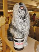 A Beswick Dulux dog.