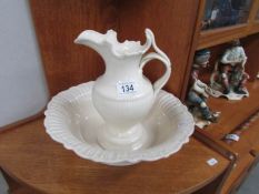 A white pottery jug and basin set.