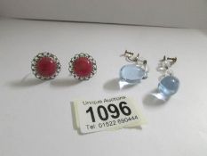 Two pairs of vintage earrings, one pendant and the other screw.