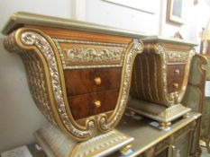 A pair of ornate gilded 3 drawer chests made by Cappelletti Cantu' Italy
