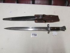 A British 1888 pattern knife bayonet for Lee-Metford with scabbard and frog,