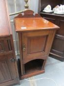 An Edwardian pot cupboard.