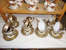 25 pieces of Romanian gold decorated tea ware (missing one saucer).