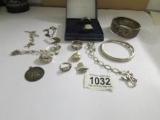 A mixed lot of silver items including bangles, pendants, rings etc.