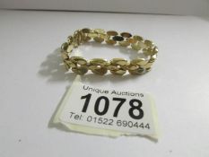 A fancy link 9ct gold bracelet, 14.6 grams.