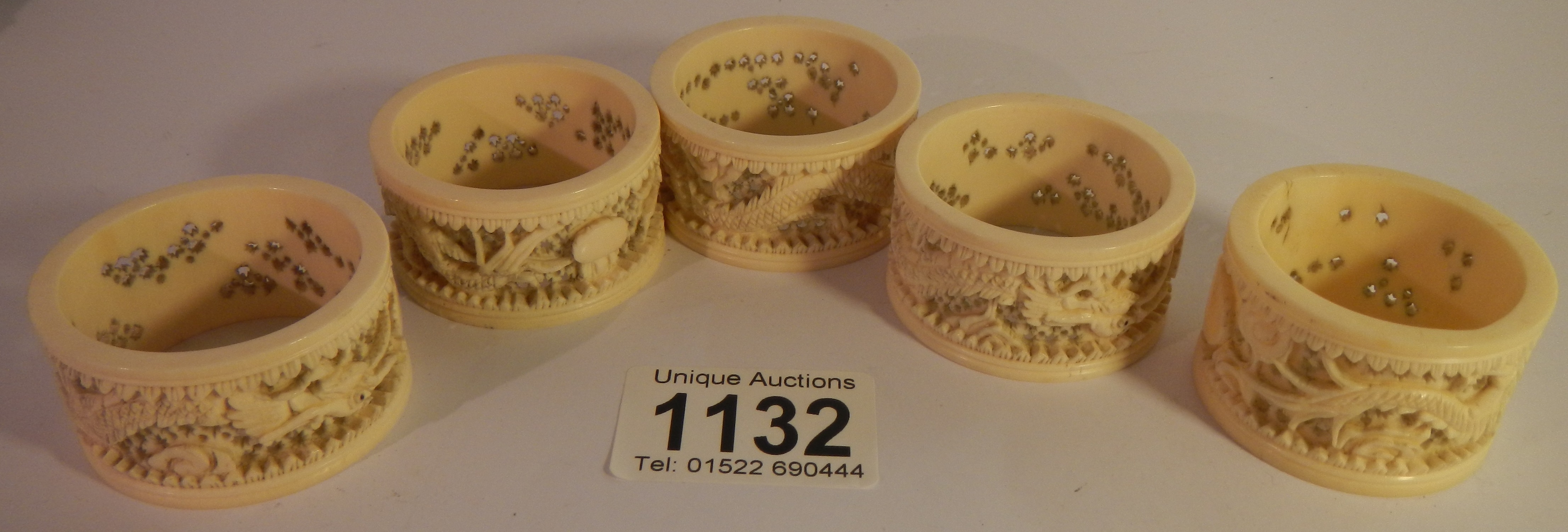 5 19th century carved ivory napkin rings.