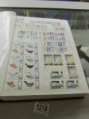 An album of Uk pre decimal mint stamps in album with many blocks (several hundred stamps).