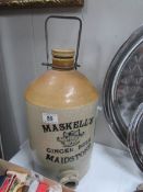 A large stoneware ginger beer jar marked Maskell's, Maidstone.