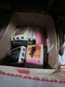 2 boxes of cassettes,