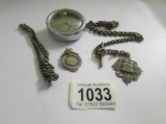 An H.Samuel Defiance pocket watch together with 2 silver watch chains and 2 silver fobs.