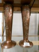 A pair of Art Nouveau copper vases.
