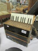 A vintage accordion, a/f.
