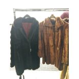 2 fur jackets,