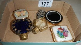 3 ornate scent bottles, 2 small compacts and a pill box.