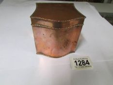 A Georgian copper tea caddy.