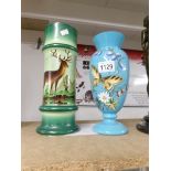 2 hand painted glass vases depicting stag and butterfly.