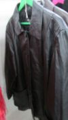 A black leather Milan jacket, size 22, Polyester lining.