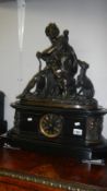 A Victorian clock surmounted figure & dog