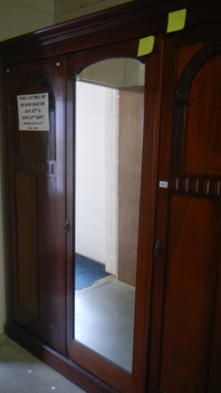 A Victorian compactum wardrobe with mirror & decorative panels