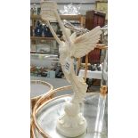 An angel candle holder.