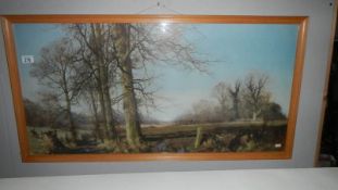 A framed and glazed woodland scene.