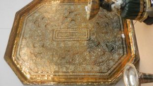 A large oriental brass tray.