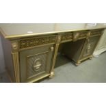 A gilded sideboard