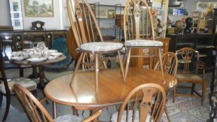 An Ercol table & chairs