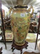 A Chinese vase on stand.