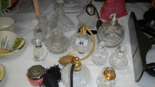 A mixed lot of perfume bottles.